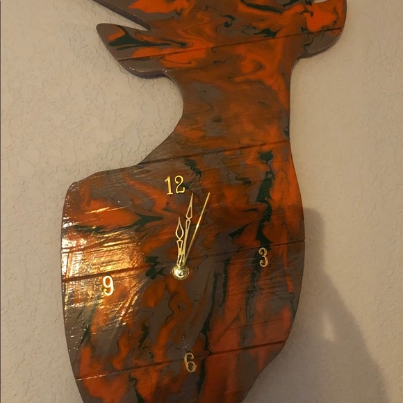 Wood deer cut out.Made into a clock